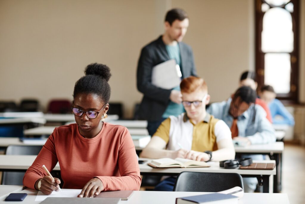 students taking exam in classroom 2022 06 29 19 28 46 utc 1